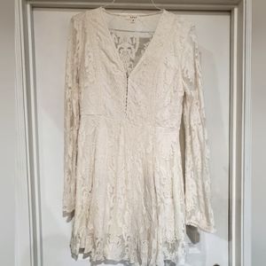 Flowy, cream flower long-sleeve dress with clasp front close